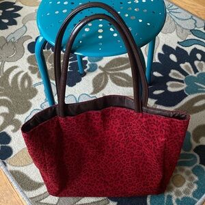 Used Neiman Marcus red cheetah print tote bag